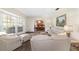 Bright living room features hardwood floors, and a view into the dining room at 2528 Se 15Th St, Ocala, FL 34471