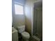 Simple bathroom with shower and toilet at 7 Emerald Ct, Ocala, FL 34472