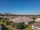 Aerial view of single-Gathering home, showcasing roofline and landscaping at 8852 Se 119Th St, Summerfield, FL 34491