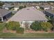 Single-story house with surrounding community view at 8852 Se 119Th St, Summerfield, FL 34491
