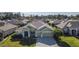 One-story house in a residential neighborhood with a large yard at 8852 Se 119Th St, Summerfield, FL 34491