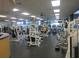 Well-equipped fitness center with various weight machines and cardio equipment at 8852 Se 119Th St, Summerfield, FL 34491