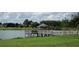Serene lake view with gazebo and pier access at 8852 Se 119Th St, Summerfield, FL 34491