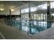 Community pool with large windows and plenty of natural light at 8852 Se 119Th St, Summerfield, FL 34491
