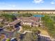 Aerial view of clubhouse near a lake at 8873 Sw 59Th Lane Rd, Ocala, FL 34481