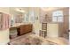 Elegant bathroom with walk-in shower, double vanity, and large mirror at 9015 Sw 86Th Loop, Ocala, FL 34481