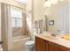 Bathroom with bathtub, toilet and vanity at 9015 Sw 86Th Loop, Ocala, FL 34481