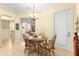 Charming dining room with a round table and four chairs at 9015 Sw 86Th Loop, Ocala, FL 34481