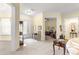 Elegant entryway with a view of a living room and hallway at 9015 Sw 86Th Loop, Ocala, FL 34481