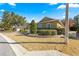 Landscaped yard with stone border and house detail at 9015 Sw 86Th Loop, Ocala, FL 34481