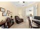 Bright home office with built-in shelving and comfortable seating at 9015 Sw 86Th Loop, Ocala, FL 34481