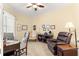 Home office with a desk, chair, and relaxing armchair at 9015 Sw 86Th Loop, Ocala, FL 34481