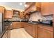 Modern kitchen with granite countertops and stainless steel appliances at 9015 Sw 86Th Loop, Ocala, FL 34481
