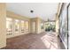 Large screened porch with brick pavers and access to interior at 9015 Sw 86Th Loop, Ocala, FL 34481