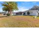 Large backyard with palm trees and screened porch at 9158 Sw 91St Ter, Ocala, FL 34481
