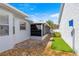 Backyard with screened porch and artificial turf at 9158 Sw 91St Ter, Ocala, FL 34481