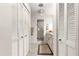 Bathroom with granite countertop, walk-in shower, and updated vanity at 9158 Sw 91St Ter, Ocala, FL 34481