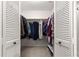 Large walk-in closet with ample hanging and shelving space at 9158 Sw 91St Ter, Ocala, FL 34481