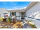 Front porch with seating and well-maintained landscaping at 9158 Sw 91St Ter, Ocala, FL 34481