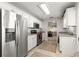 Modern kitchen with stainless steel appliances and granite countertops at 9158 Sw 91St Ter, Ocala, FL 34481