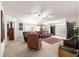 Relaxing living room featuring brown leather sofas and armchairs at 9158 Sw 91St Ter, Ocala, FL 34481