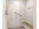 Walk-in shower with grab bar and tiled walls at 9158 Sw 91St Ter, Ocala, FL 34481