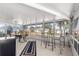 Sunroom with table and chairs, barstools and a view at 9158 Sw 91St Ter, Ocala, FL 34481