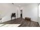 Spacious bonus room with wood-look floors and adjacent dining area at 10406 Sw 96 Loop, Ocala, FL 34481