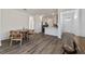 Bright dining area with wood table and chairs, adjacent to kitchen at 10406 Sw 96 Loop, Ocala, FL 34481