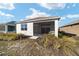 Charming one-story house with screened porch at 10406 Sw 96 Loop, Ocala, FL 34481