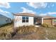 Cute one-story house with screened porch at 10406 Sw 96 Loop, Ocala, FL 34481