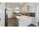 Modern kitchen with stainless steel appliances and an island at 10406 Sw 96 Loop, Ocala, FL 34481