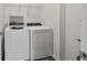 Bright laundry room with washer and dryer at 10406 Sw 96 Loop, Ocala, FL 34481