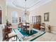 Elegant dining room featuring a chandelier and hardwood floors at 3000 Nw 79Th Avenue Rd, Ocala, FL 34482