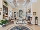 Cozy Gathering room with fireplace and large windows at 3000 Nw 79Th Avenue Rd, Ocala, FL 34482