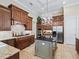 Modern kitchen with large island and breakfast bar at 3000 Nw 79Th Avenue Rd, Ocala, FL 34482