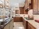 Gourmet kitchen boasting granite countertops and custom cabinetry at 3000 Nw 79Th Avenue Rd, Ocala, FL 34482