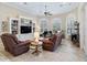 Relaxing living room with comfortable seating and built-in shelving at 3000 Nw 79Th Avenue Rd, Ocala, FL 34482