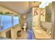 Updated bathroom with a shower, toilet, and vanity at 6121 County Road 547 N, Davenport, FL 33837