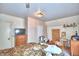 Upstairs bedroom with TV and dresser at 6121 County Road 547 N, Davenport, FL 33837