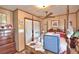 Bedroom with four poster bed, dresser and built in closet at 6121 County Road 547 N, Davenport, FL 33837