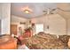 Bedroom with double bed and ceiling fan at 6121 County Road 547 N, Davenport, FL 33837