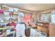 Small bedroom with a dresser and shelves at 6121 County Road 547 N, Davenport, FL 33837