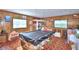 Game room with pool table and storage at 6121 County Road 547 N, Davenport, FL 33837