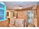Laundry room with washer, dryer, and additional storage at 6121 County Road 547 N, Davenport, FL 33837