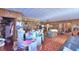 Living area with seating, work table and views to dining room at 6121 County Road 547 N, Davenport, FL 33837