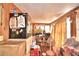 Sunroom with desk and mini-fridge at 6121 County Road 547 N, Davenport, FL 33837