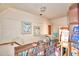 Upstairs hallway with built-in shelving and art at 6121 County Road 547 N, Davenport, FL 33837