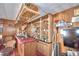 Home bar with seating and ample storage at 6121 County Road 547 N, Davenport, FL 33837