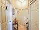 Charming hallway with antique furniture and decorative wall art at 4880 Bannon Island Rd, Haines City, FL 33844